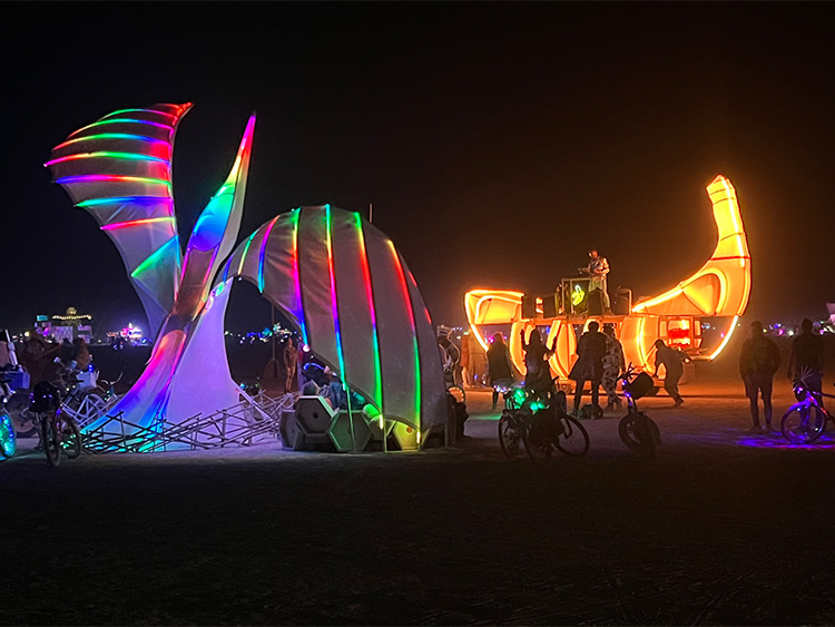 The Banana, in all its glowing yellow glory, at Burning Man.